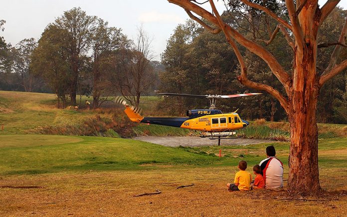 golf course bushfire helicopter