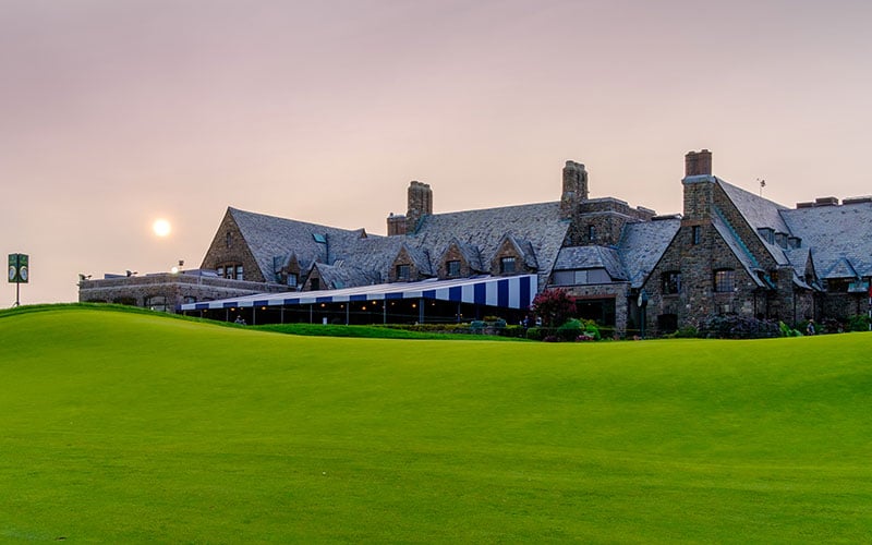 The sun rises over the clubhouse during a practice round 2020 U.S. Open at Winged Foot Golf Club in Mamaroneck, N.Y. on Tuesday, Sept. 15, 2020. (USGA/John Mummert)