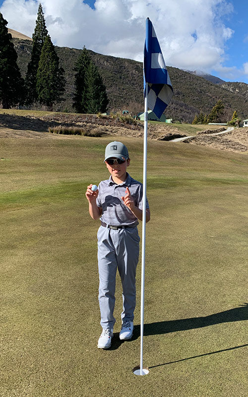 Josh Harris with his hole in one ball and pin. (Supplied)