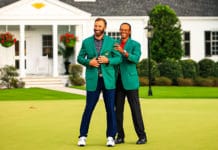Dustin Johnson Wins His First Green Jacket Tiger Woods puts the green jacket on Dustin Johnson after he won the Masters golf tournament at Augusta National Golf Club.