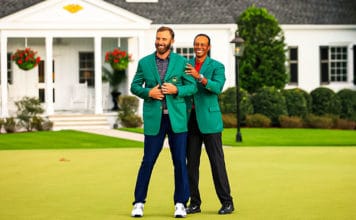 Dustin Johnson Wins His First Green Jacket Tiger Woods puts the green jacket on Dustin Johnson after he won the Masters golf tournament at Augusta National Golf Club.
