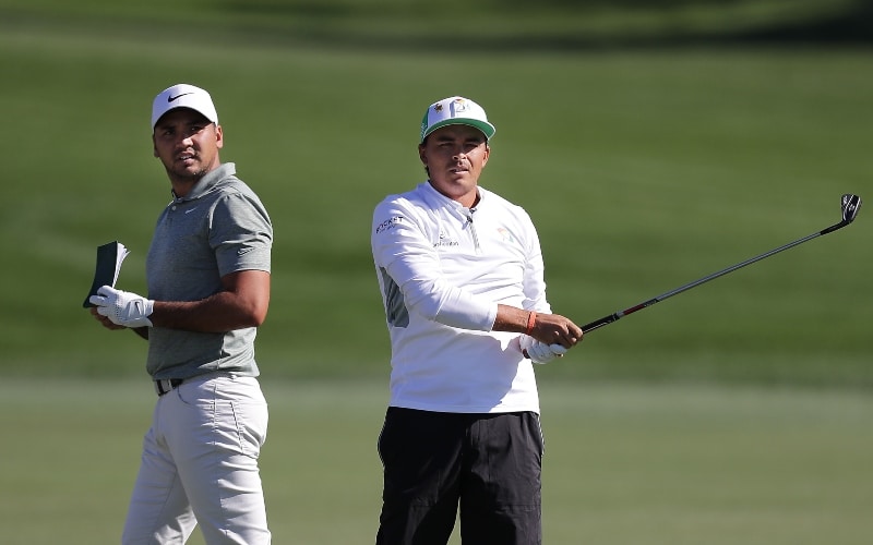 Rickie Fowler of the United States plays a shot on the 16th fairway as Jason Day of Australia looks on during the first round of the Arnold Palmer Invitational Presented by Mastercard at the Bay Hill Club on March 07, 2019 in Orlando, Florida. (Photo by Richard Heathcote/Getty Images) 