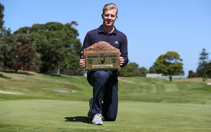 James Anstiss with the Christies Floorings Mount Open trophy. (Golf NZ)