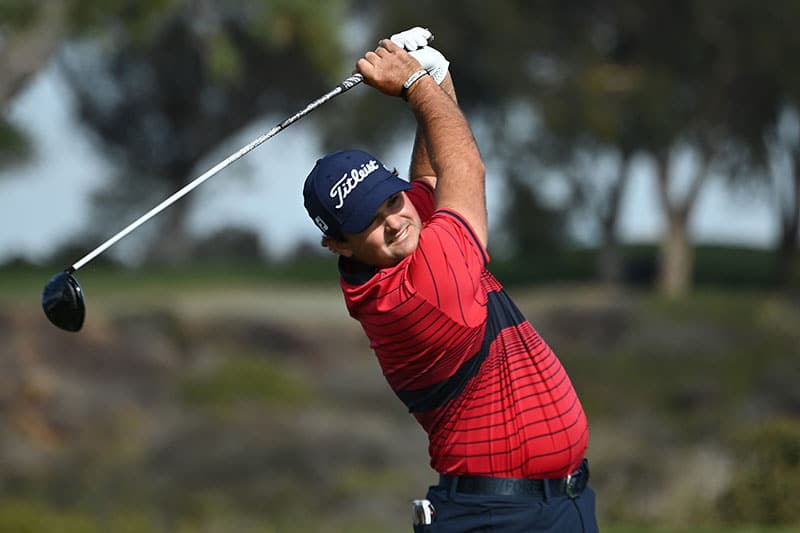 Patrick Reed hits his tee shot on the 5th hole during the final round of the Farmers Insurance Open at Torrey Pines South on January 31, 2021 in San Diego, California. (Photo by Donald Miralle/Getty Images)