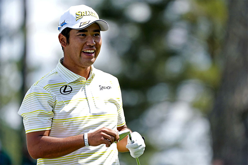 Hideki Matsuyama walks off the third tee during the final round of The Masters