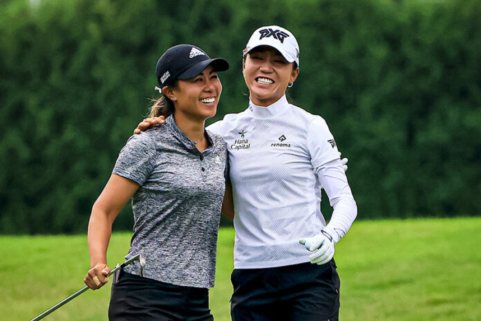 Danielle Kang (L) and Lydia Ko celebrate an eagle on the 11th hole during the second round of the Dow Great Lakes Bay Invitational at Midland Country Club in Midland, Michigan. (Photo by Sam Greenwood/Getty Images)