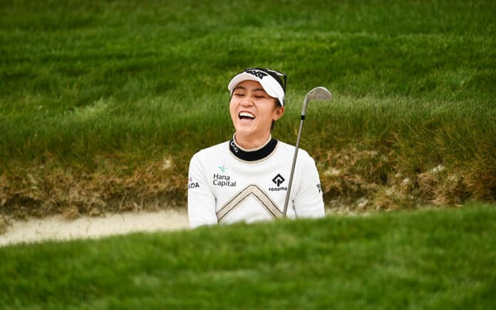 Kiwi Lydia Ko reacts to a bunker shot on the 11th hole during a practice round at the 2021 U.S. Women's Open at The Olympic Club in San Francisco. (Robert Beck/USGA)