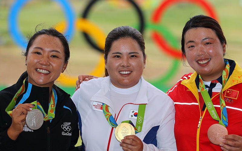 (L-R) Lydia Ko of New Zealand, silver medalist, Inbee Park of South Korea, gold medalist and Shanshan Feng of China with the bronze medal pose with medals at the Rio 2016 Olympic Games at the Olympic Golf Course on August 20, 2016 in Rio de Janeiro, Brazil. (Photo by SWarren Little/Getty/IGF)