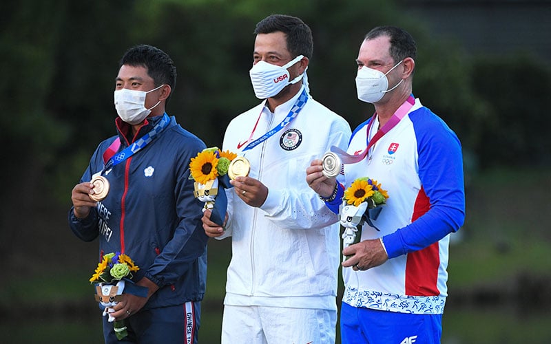 C.T. Pan of Chinese Taipei, Xander Schauffele of the United States, and Rory Sabbatini of Slovakia