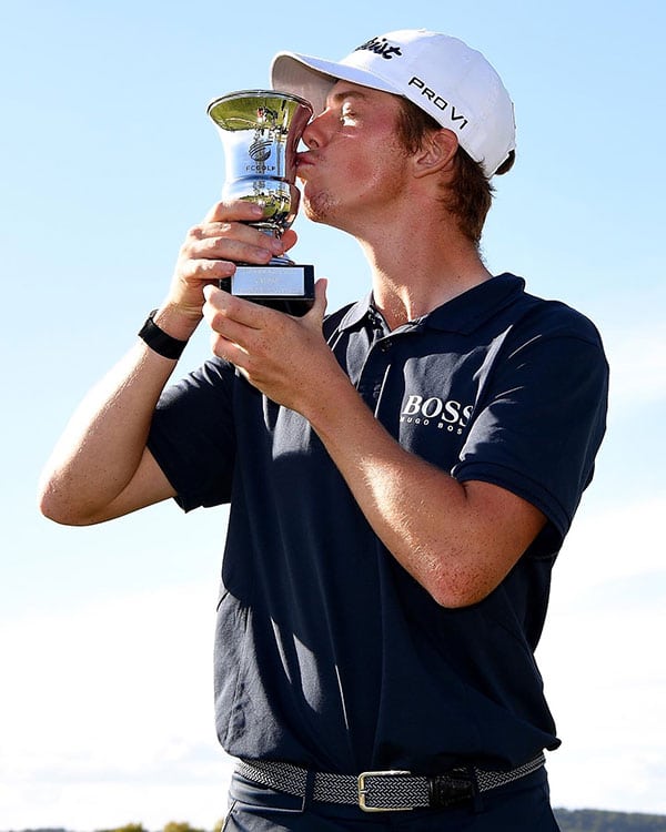 Daniel Hillier kisses the trophy after winning his maiden Challenge Tour title in Spain. (European Tour Twitter)